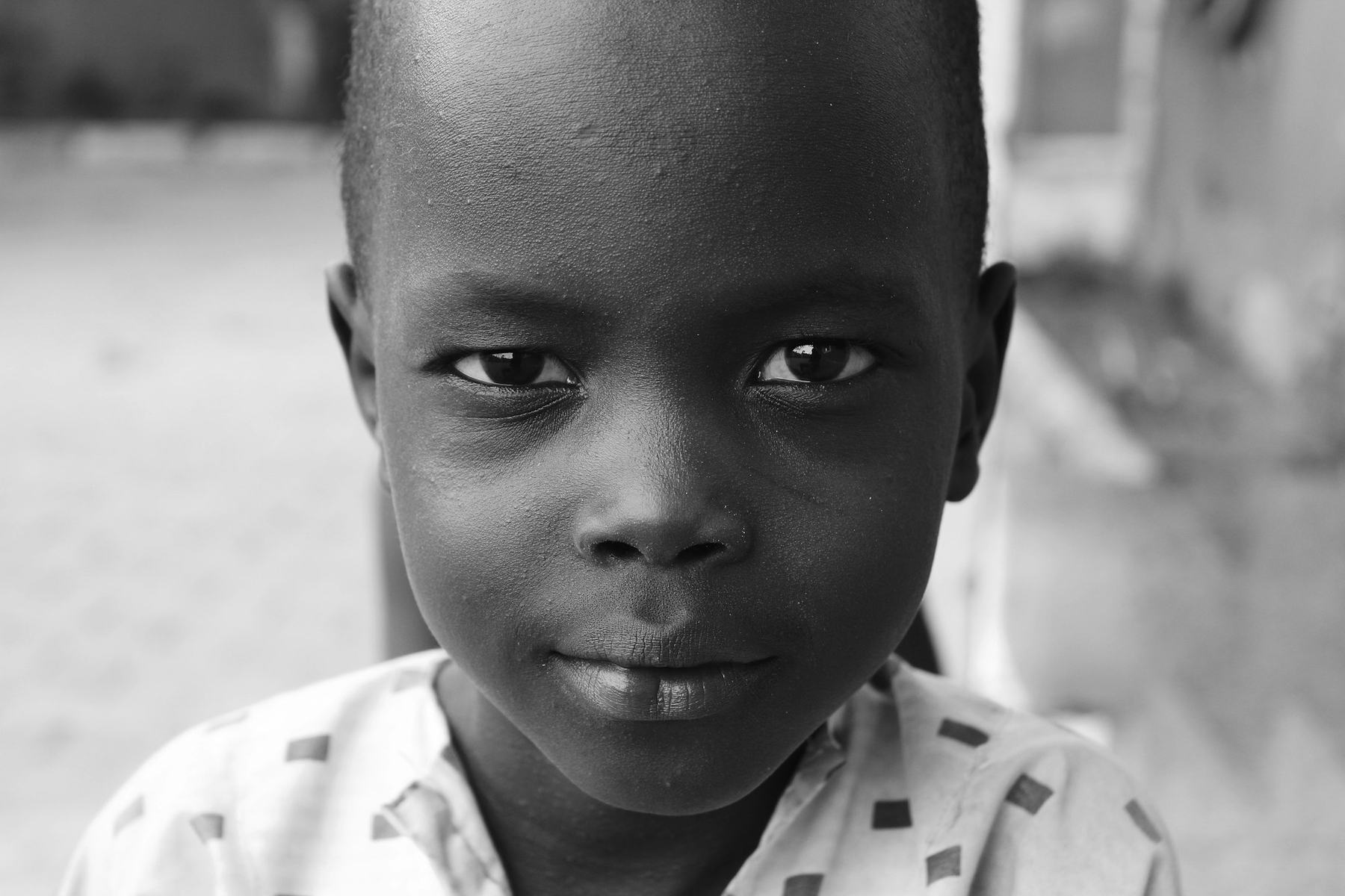 A boy looking straight into the camera